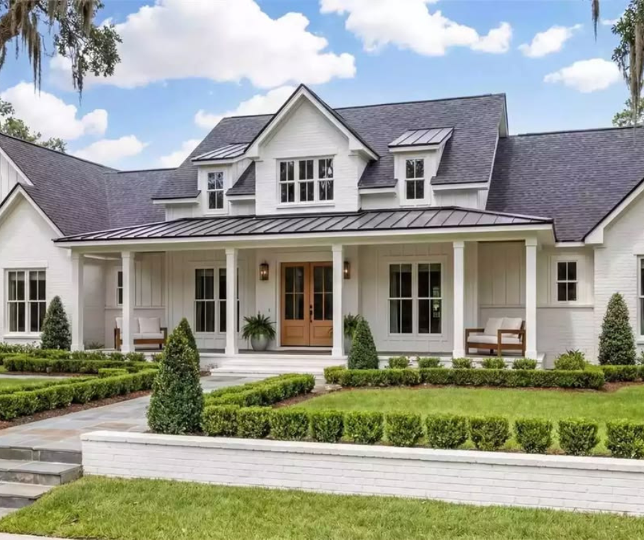 Defined borders and hedges: formal shrubs, lawn, house approach